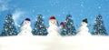 Winter  season ,snowman and Christmas tree with decoration on snow and blue sky Holiday banner template background Royalty Free Stock Photo