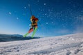 2021 winter season start skier on the ski slope jumping Royalty Free Stock Photo