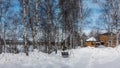 Winter Siberian Landscape. Among the snowdrifts are wooden swing bench.