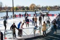 Winter skating rink in the Potomac River in Washington. Citizens with children go ice skating
