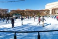 Winter skating rink in the sculpture garden of the National Gallery in Washington DC. Citizens with children go ice skating