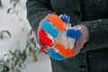 Winter ski gloves with snow ball Royalty Free Stock Photo