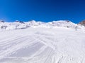 winter skiing area on a glacier with a ski slope Royalty Free Stock Photo