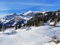 Winter snow on alpine peaks LÃÂ¼tispitz Luetispitz or Lutispitz, Schofwisspitz and Schwarzchopf in Alpstein mountain range Royalty Free Stock Photo