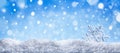 Winter snow background with decorative snowflake against blue sky. Banner format. Beautiful wintertime holiday scene Royalty Free Stock Photo