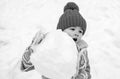 Winter snow and child game. People in snow. Happy winter time for kid. Cute boy in winter clothes. Theme Christmas Royalty Free Stock Photo