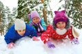 Winter , snow, children sledding at winter time Royalty Free Stock Photo