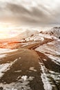 Winter snow-covered road Elbrus mountain on background