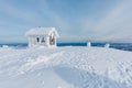 Winter snow covered wood hut. Frozen log cabin in Finland Royalty Free Stock Photo