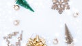 Winter snow decoration. Christmas holiday tree, golden balls in new year ornament on white winter snow background. Top Royalty Free Stock Photo