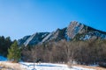 Winter Flatirons with a blue sky