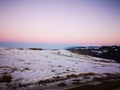 Winter snow hills sunset village