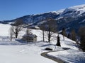 Winter snow idyll along the rural alpine road above the Obertoggenurg valley and on the slopes of the Alpstein mountain range Royalty Free Stock Photo