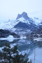 Winter and snow in Pyrenees lake Huesca Spain
