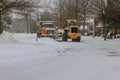 Winter the snow removal vehicle removing snow way after heavy snowfall Royalty Free Stock Photo