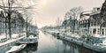 Winter snow view of a Dutch canal in Amsterdam