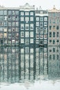 Winter snow view of Dutch canal houses in Amsterdam