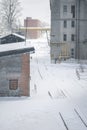 Winter, snowfall. Photo of the old factory. windows and roof of the old factory building. snow-covered old factory Royalty Free Stock Photo