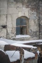 Winter, snowfall. Photo of the old factory. windows and roof of the old factory building. snow-covered old factory Royalty Free Stock Photo