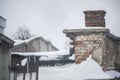 Winter, snowfall. Photo of the old factory. windows and roof of the old factory building. snow-covered old factory Royalty Free Stock Photo