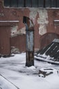 Winter, snowfall. Photo of the old factory. windows and roof of the old factory building. snow-covered old factory Royalty Free Stock Photo