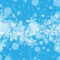 Winter snowfall and snowflakes on light blue background. Cold winter Christmas and New Year background. Royalty Free Stock Photo