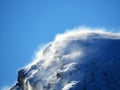 Winter snowstorm on the alpine peaks of the Churfirsten mountain range above Lake Walensee or Lake Walenstadt, Alt St. Johann Royalty Free Stock Photo