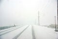 Winter snowstorm and fog makes driving hazardous Royalty Free Stock Photo