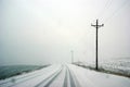 Winter snowstorm and fog makes driving hazardous Royalty Free Stock Photo