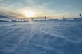 Winter snowy mountains with pillars limiters.