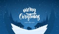 Winter snowy scene with Santa Claus in village and Hand lettering of Merry Christmas Royalty Free Stock Photo