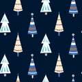 Winter snowy woods seamless pattern. Silhouettes of cute trees on dark blue background. Christmas vector wallpaper, wrap