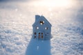 Winter solstice in snowy forest or park natural scene. Hibernal solstice. Toy house and Sparkling snow in the snowy Royalty Free Stock Photo