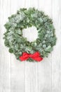 Winter Solstice Wreath with Fir and Red Bow Royalty Free Stock Photo