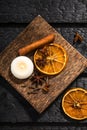 Winter spices concept. Flat lay view of various spices: cinnamon stick  clove  star anise  dried orange slices. Royalty Free Stock Photo