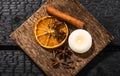 Winter spices concept. Flat lay view of various spices: cinnamon stick  clove  star anise  dried orange slices. Royalty Free Stock Photo