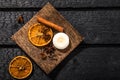 Winter spices concept. Flat lay view of various spices: cinnamon stick  clove  star anise  dried orange slices. Royalty Free Stock Photo