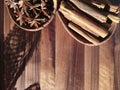 Winter spices in wooden spoons