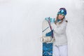 Winter, sport concept, happy young woman with snowboard outdoors Royalty Free Stock Photo