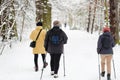 Winter sport nordic walking. Women in park