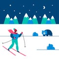 Winter sport Skiing. A person is Skier in the mountain slope in Winter-time day. Mountains landscape with polar bear