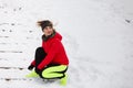 Woman tying sport shoes during winter Royalty Free Stock Photo