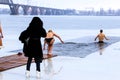 Winter sports, Hardening. People swimming in the river. Orthodox holiday of Epiphany, Dnipro city, Dnepropetrovsk, Ukraine,