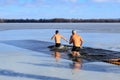 Winter sports, Hardening. People swimming in the river holes in winter. Orthodox holiday of Epiphany, Dnipro city, Dnepropetrovsk