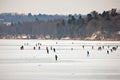 winter sports & x28;skating, sledding, snowshoeing& x29; on a frozen lake