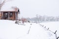 Winter, spring fishing on paid snow covered ice pond,lake in beautiful country club.Catching fish with spinner,bait,net.Fisherman Royalty Free Stock Photo