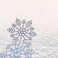 Winter square background with beautiful silver snowflake on whiteness snow surface. Merry Christmas and Happy New year greeting
