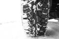 Winter studded tire on white snow as symbol of safe driving Royalty Free Stock Photo