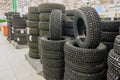 winter studded tires in the supermarket of automobile tires a Royalty Free Stock Photo
