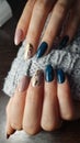 Winter style manicure design with sweater sleeve
